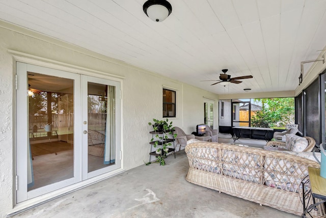 view of patio with an outdoor hangout area, ceiling fan, and french doors