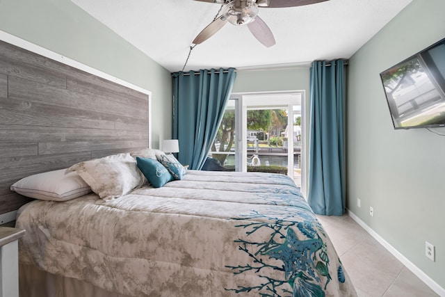 bedroom with light tile patterned floors and ceiling fan