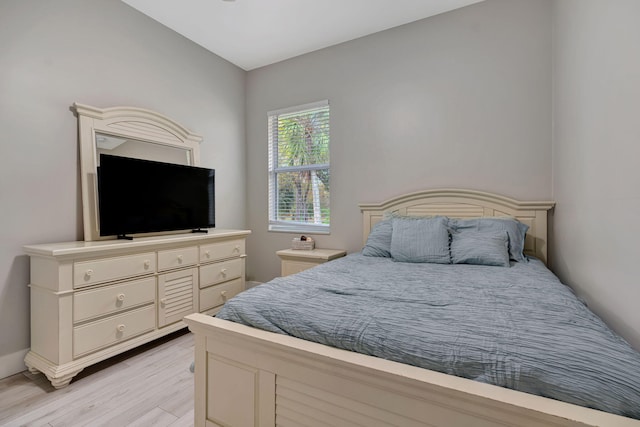 bedroom with light wood-type flooring