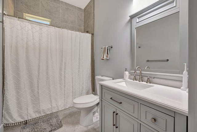 bathroom featuring curtained shower, vanity, and toilet