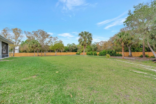 view of yard with fence