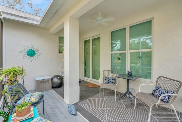 exterior space featuring a ceiling fan