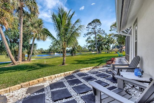 view of patio / terrace featuring a water view