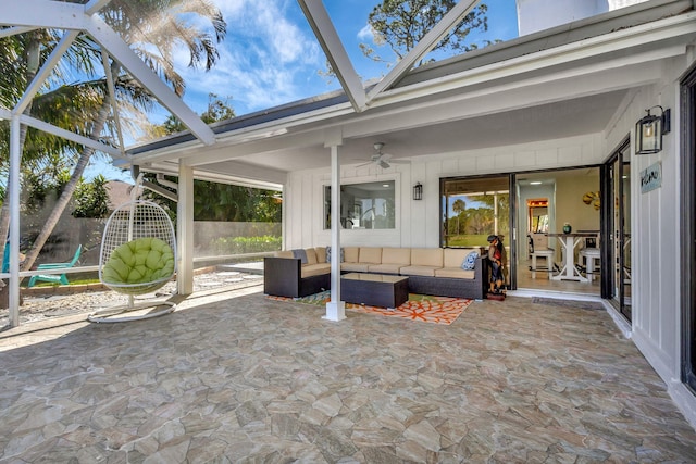 view of patio featuring an outdoor hangout area and ceiling fan