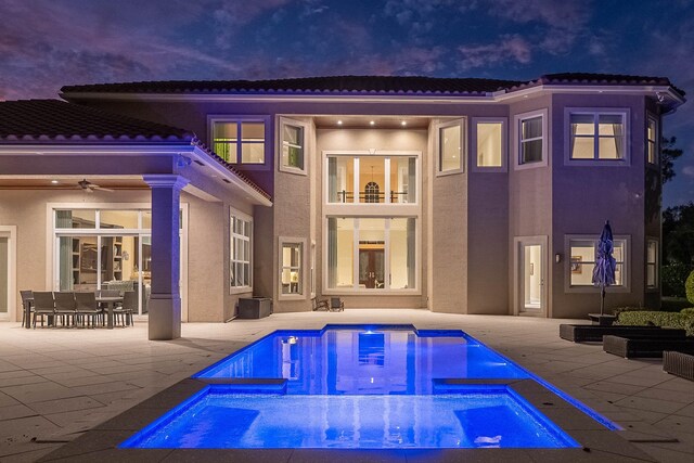 mediterranean / spanish-style house with french doors and a garage