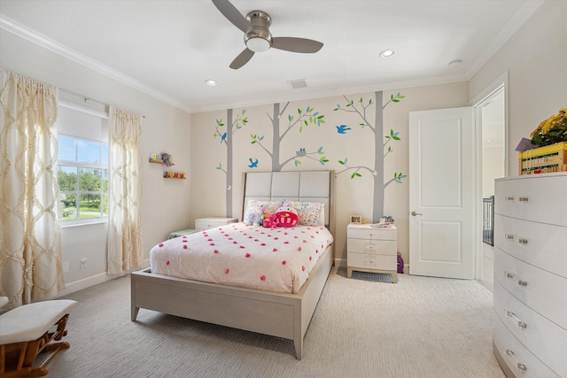 carpeted bedroom with ceiling fan and ornamental molding