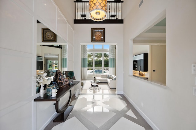 hallway with a towering ceiling