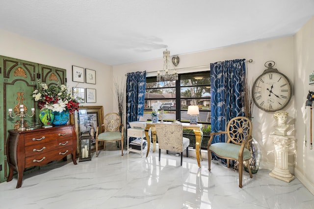 sitting room with an inviting chandelier