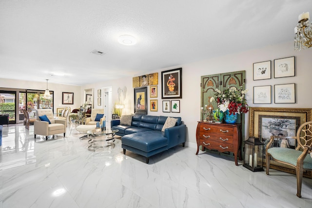 living room with a textured ceiling