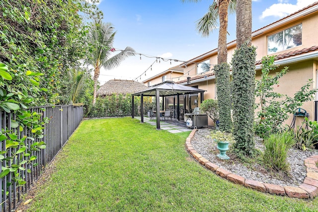 view of yard with a gazebo and a patio