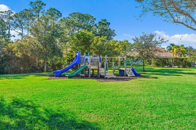 view of playground with a yard