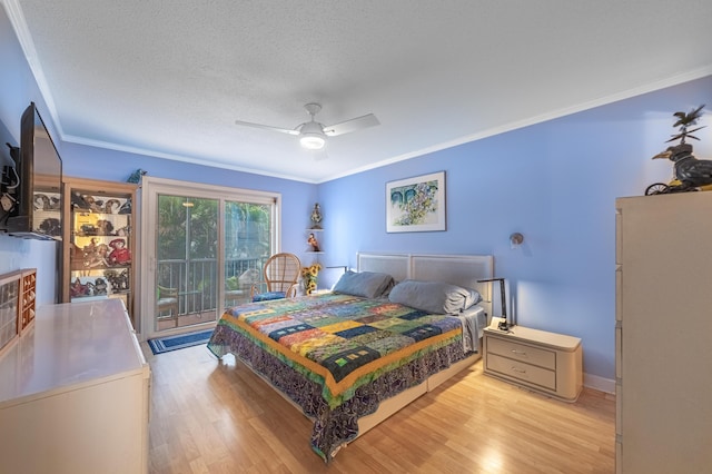 bedroom featuring ceiling fan, access to exterior, light wood-type flooring, and crown molding