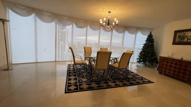 tiled dining space with a textured ceiling and an inviting chandelier