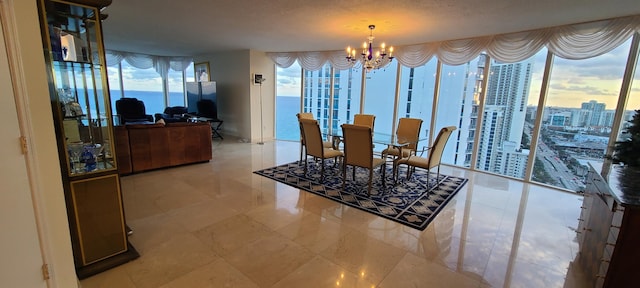 dining space featuring an inviting chandelier