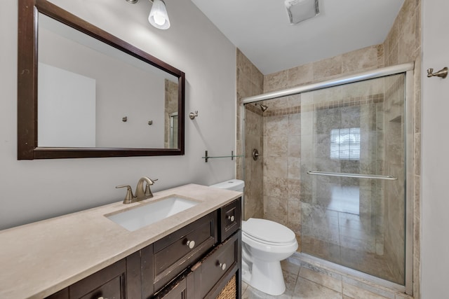 bathroom with vanity, an enclosed shower, tile patterned floors, and toilet