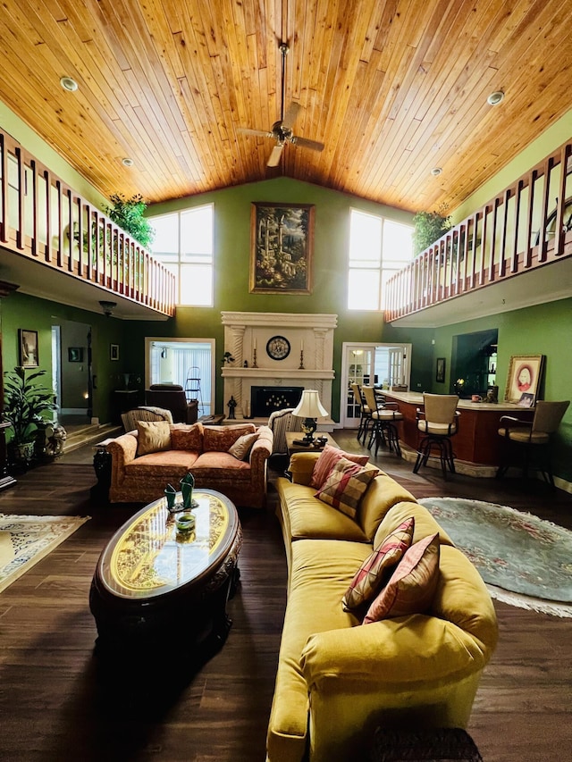 living room featuring high vaulted ceiling, ceiling fan, hardwood / wood-style floors, and wood ceiling