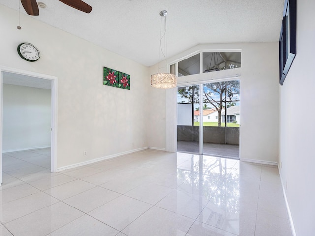 1784 Sawgrass Cir, Greenacres, FL 33413 - unfurnished room featuring ceiling fan, lofted ceiling, tile patterned floors, baseboards, and a textured ceiling