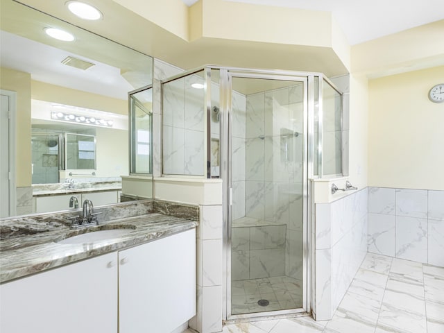 1784 Sawgrass Cir, Greenacres, FL 33413 - bathroom featuring a stall shower, marble finish flooring, recessed lighting, and vanity