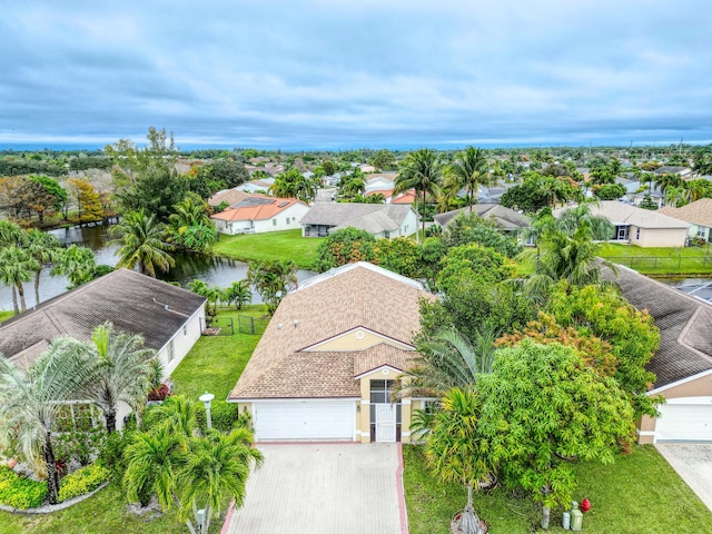 1784 Sawgrass Cir, Greenacres, FL 33413 - aerial view of residential area with a large body of water