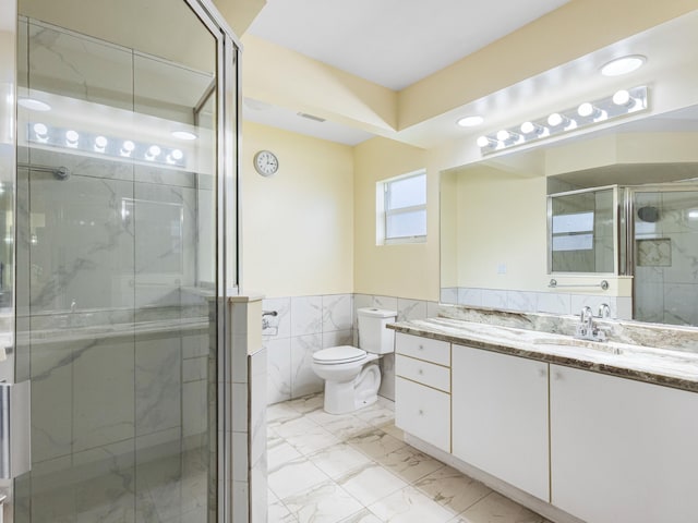 1784 Sawgrass Cir, Greenacres, FL 33413 - full bath with marble finish flooring, tile walls, a shower stall, toilet, and vanity