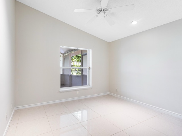 1784 Sawgrass Cir, Greenacres, FL 33413 - tiled empty room featuring lofted ceiling, baseboards, and a ceiling fan