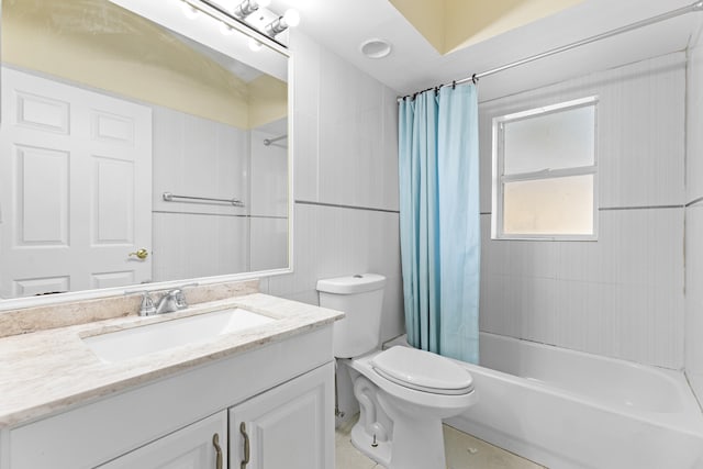 full bathroom with toilet, shower / tub combo, and vanity