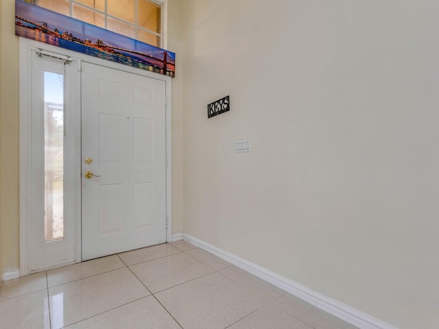 foyer featuring light tile patterned floors