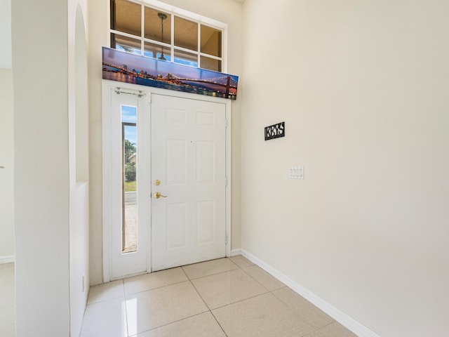 1784 Sawgrass Cir, Greenacres, FL 33413 - tiled foyer entrance with baseboards and arched walkways