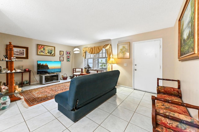 tiled living room with a textured ceiling