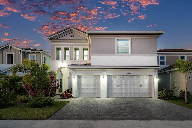 view of front of property with a garage