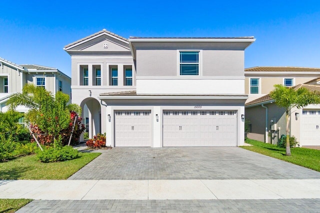 view of front of home with a garage