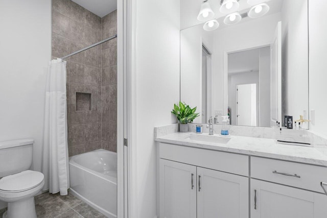 full bathroom featuring toilet, shower / tub combo, and vanity