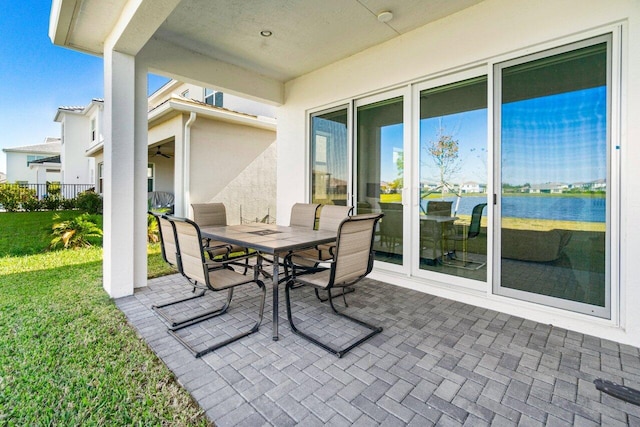 view of patio / terrace featuring a water view