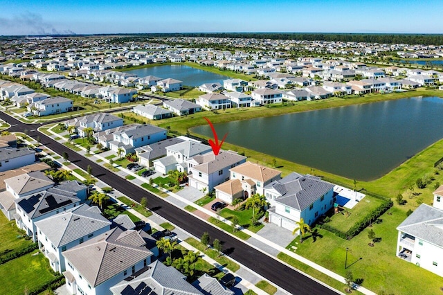 drone / aerial view featuring a water view