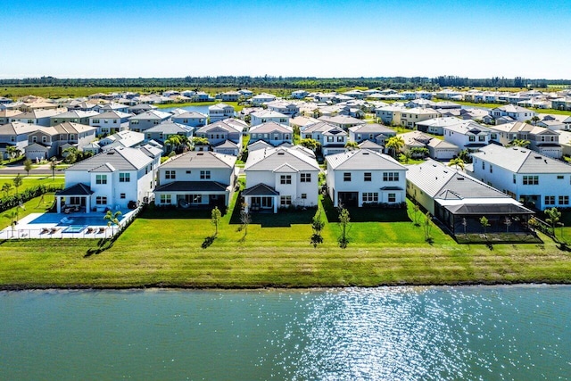 drone / aerial view with a water view