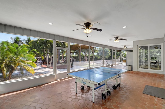 recreation room with ceiling fan