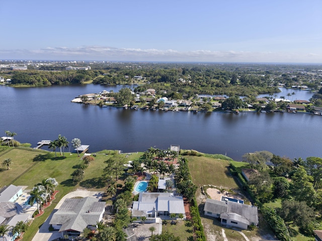 birds eye view of property featuring a water view