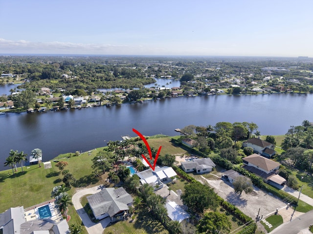 birds eye view of property featuring a water view