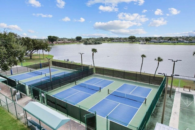 view of sport court featuring a water view and basketball court