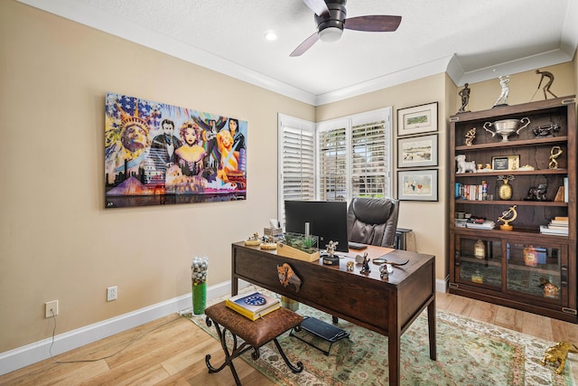 office space with ceiling fan, crown molding, a textured ceiling, and wood-type flooring