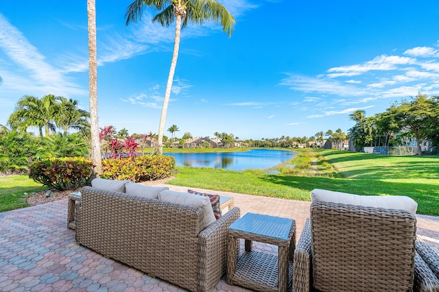 view of patio featuring a water view