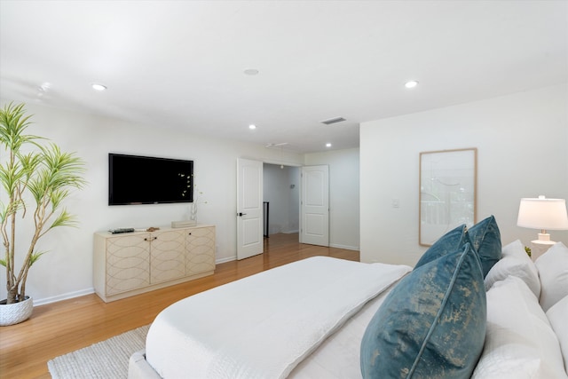 bedroom featuring wood-type flooring