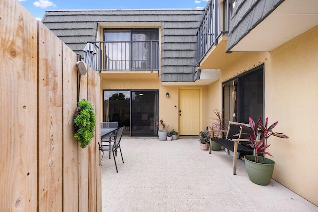 view of patio / terrace with a balcony