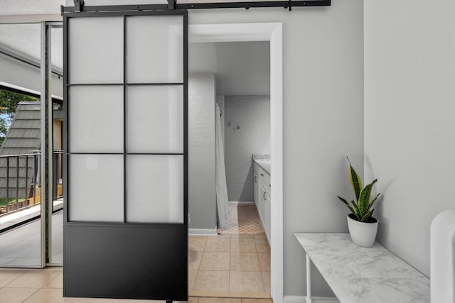 bathroom featuring tile patterned flooring