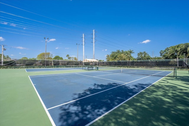 view of sport court featuring basketball hoop