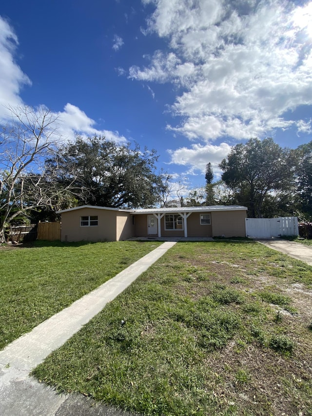 view of front of home with a front yard