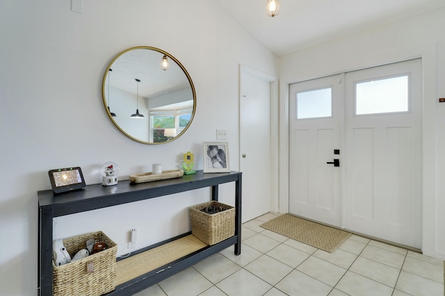 entrance foyer with light tile patterned floors