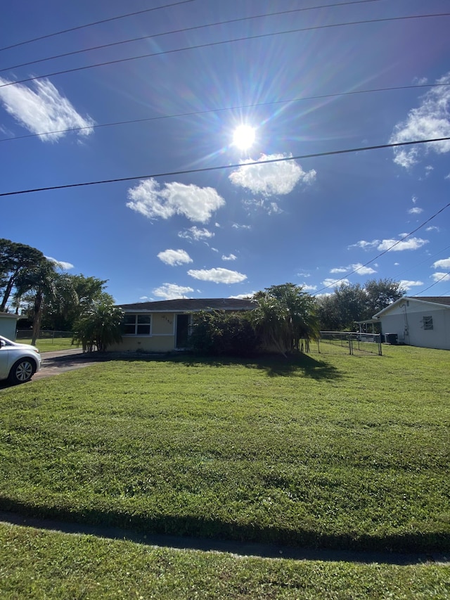 view of front of property with a front lawn