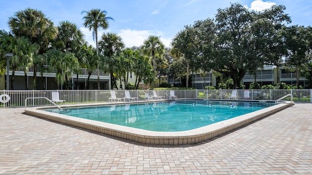 view of pool featuring a patio area