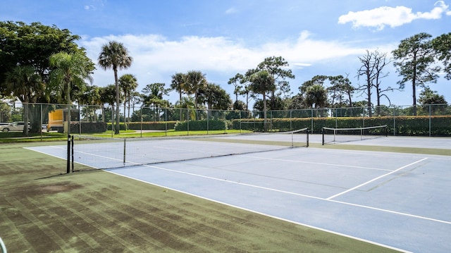 view of sport court featuring basketball hoop